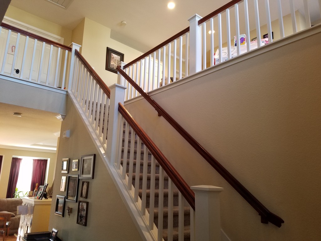 Re-staining interior railing color to dark Dark stairway handrails after staining with Mohawk tinted lacquer.
