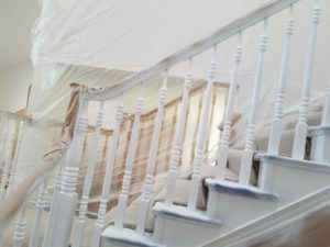primed stairway spindles with masking